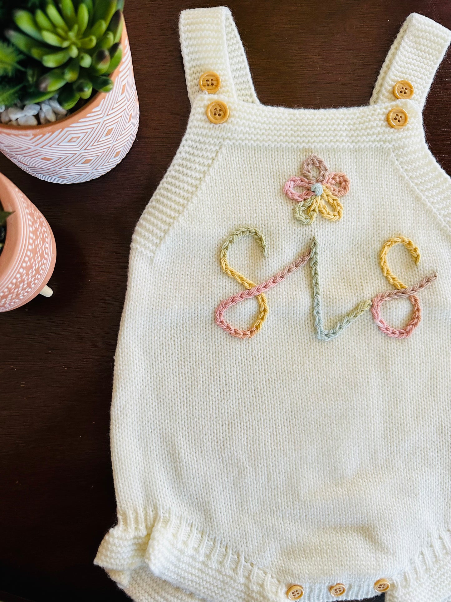 white personalized hand-embroidered romper "sis"